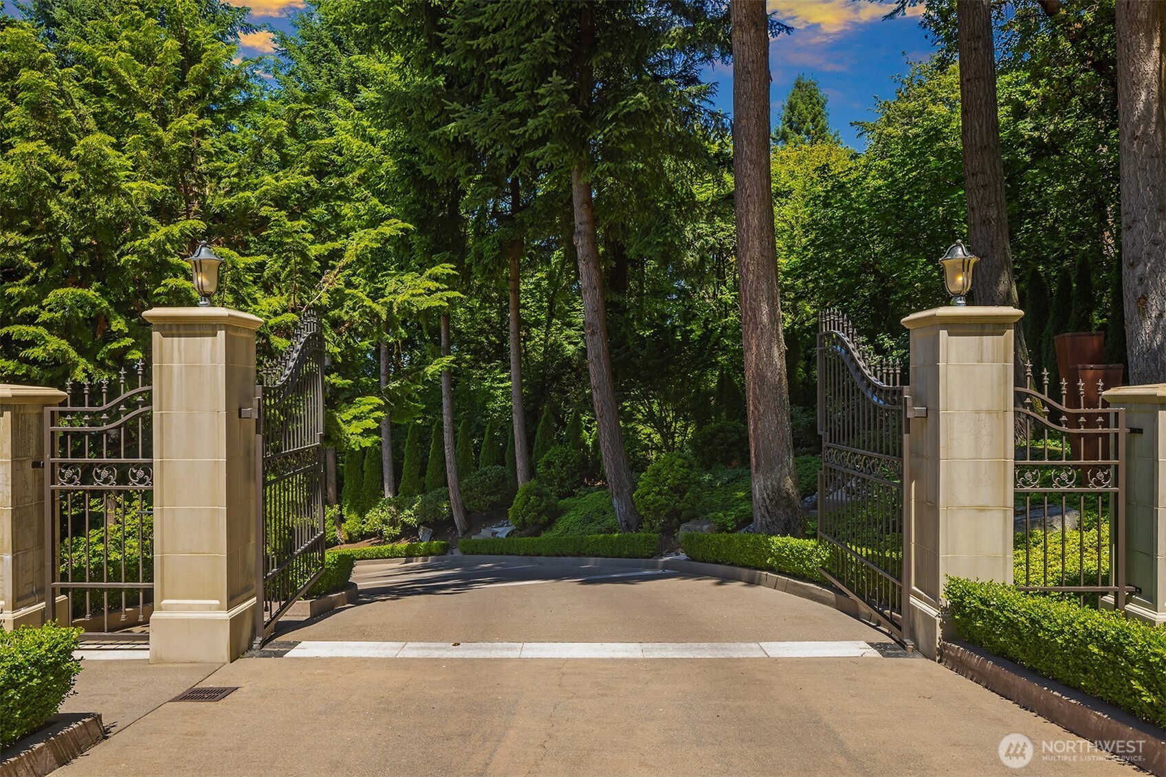 Undisclosed Address Mercer Island, WA 98040 - Photo 4 of 28 a view of a fountain with palm trees