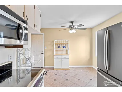a view of a kitchen with a sink and dishwasher