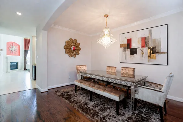 a bench sitting in a living room with a rug