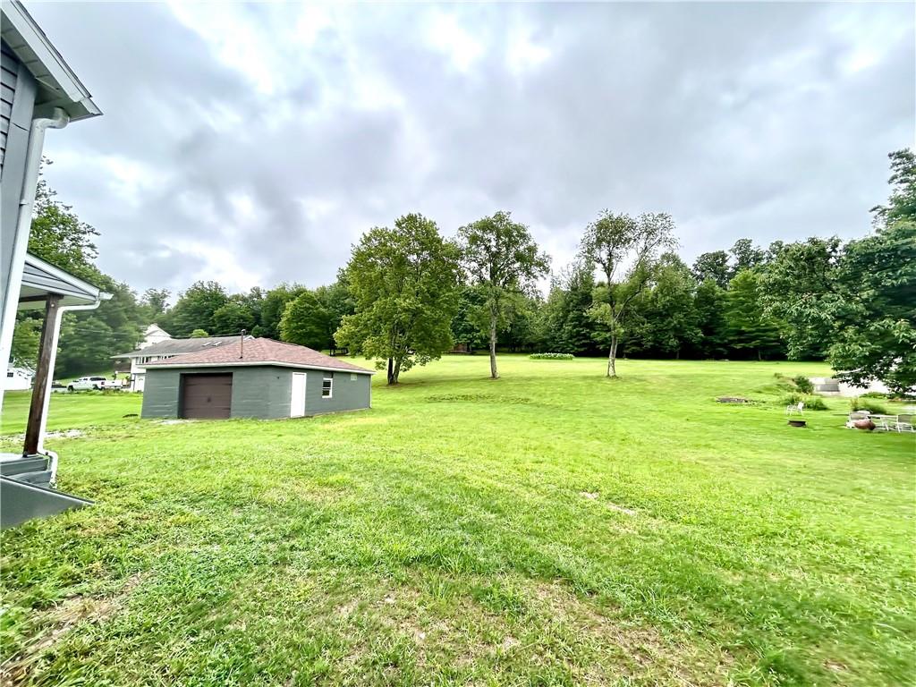 718 Breakneck Road Connellsville, PA 15425 - Photo 5 of 30 a house view with a garden space