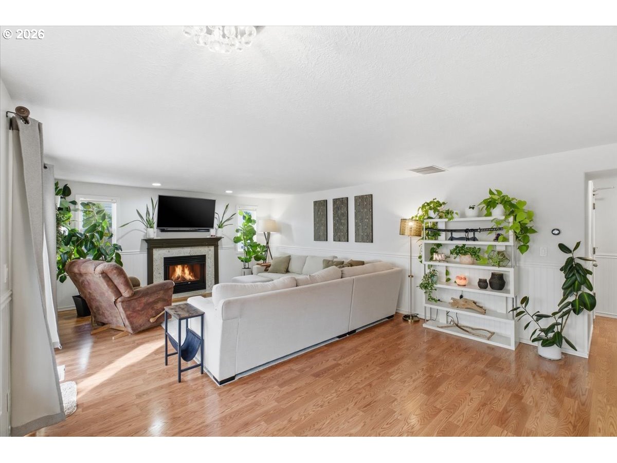 229 Hazelbrook Drive North Keizer, OR 97303 - Photo 11 of 48 a living room with furniture and a fireplace