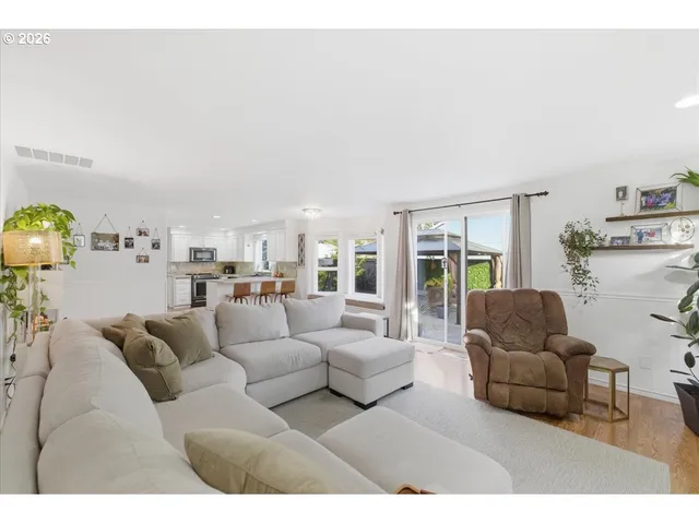 a living room with furniture and a couch