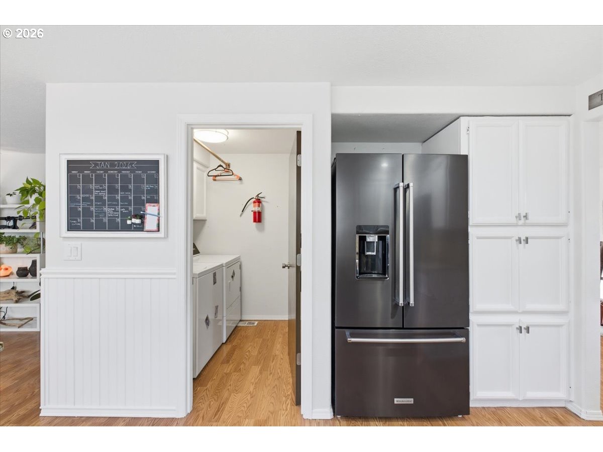 229 Hazelbrook Drive North Keizer, OR 97303 - Photo 22 of 48 a kitchen with stainless steel appliances refrigerator and microwave