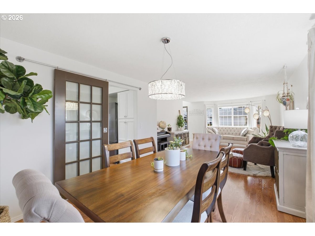 229 Hazelbrook Drive North Keizer, OR 97303 - Photo 25 of 48 a view of a dining room with furniture window and wooden floor