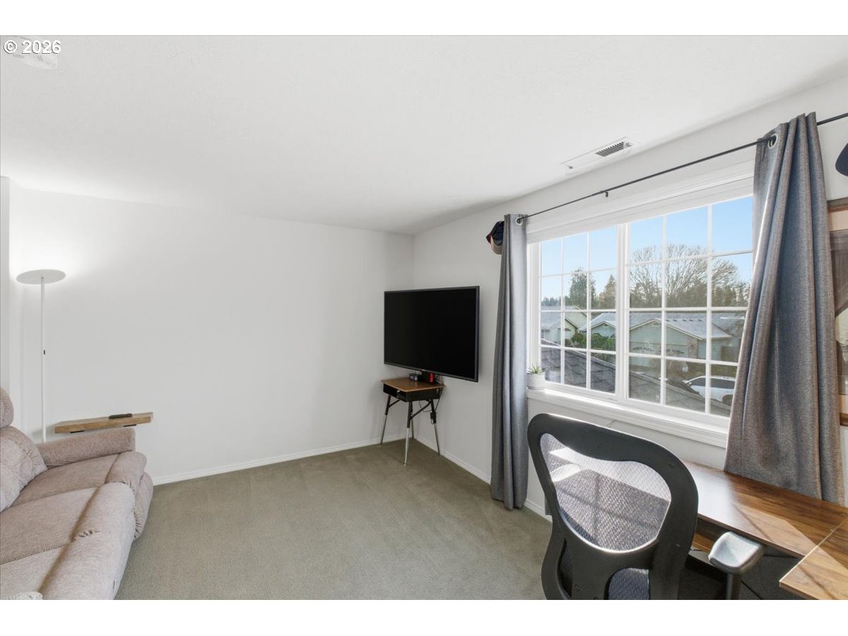 229 Hazelbrook Drive North Keizer, OR 97303 - Photo 29 of 48 a living room with furniture and a flat screen tv