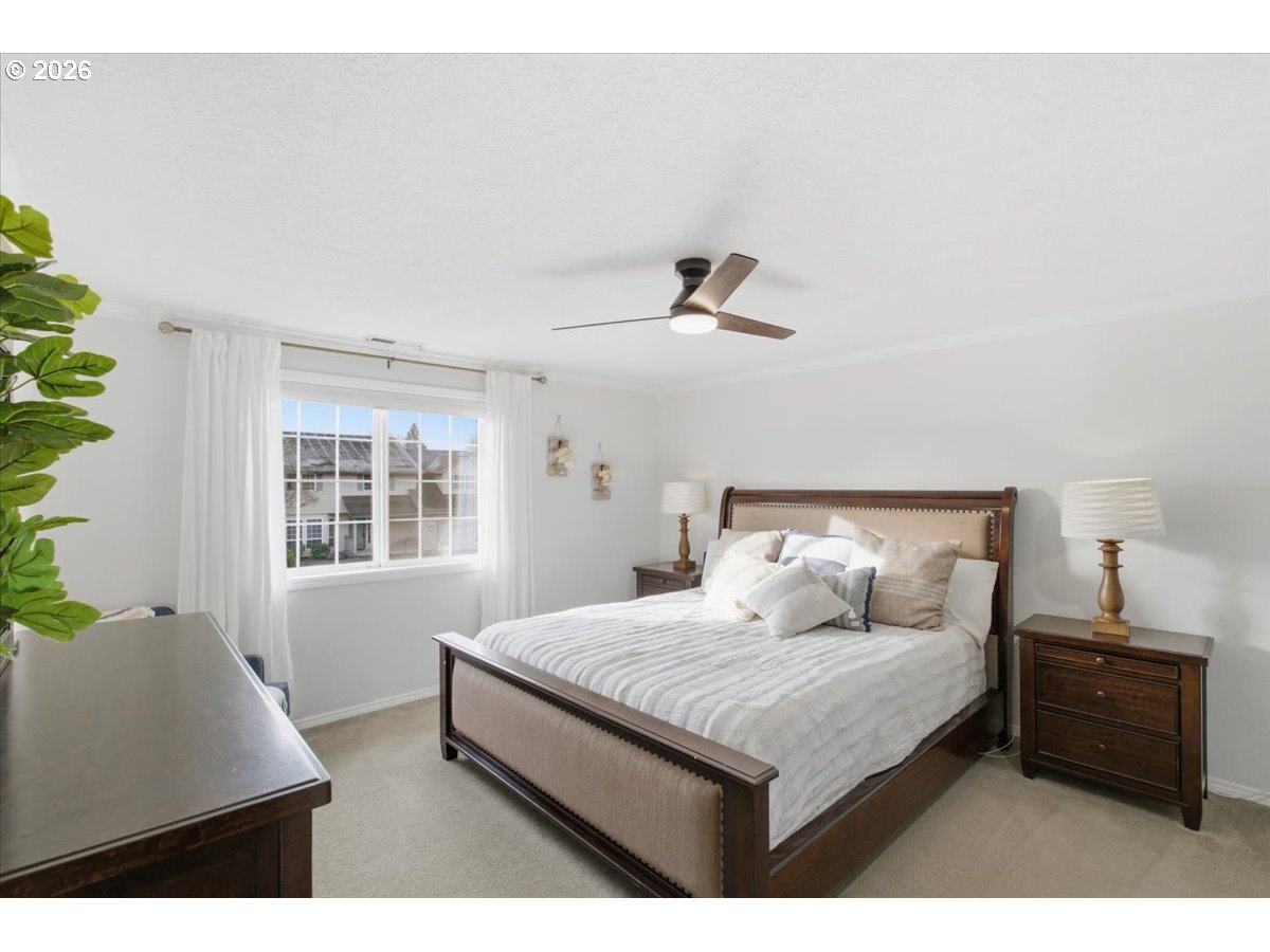 229 Hazelbrook Drive North Keizer, OR 97303 - Photo 30 of 48 a bedroom with a bed and a window