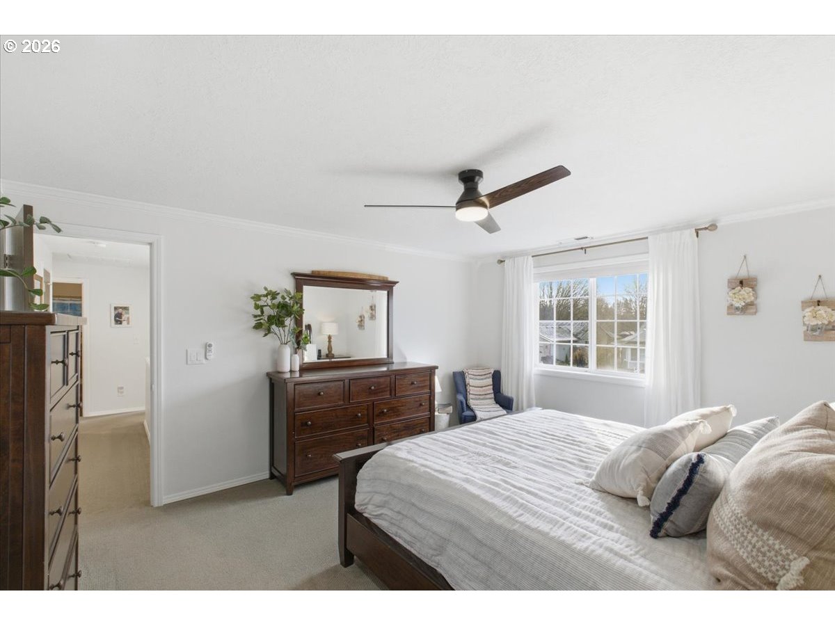 229 Hazelbrook Drive North Keizer, OR 97303 - Photo 31 of 48 a bedroom with a bed and a dresser