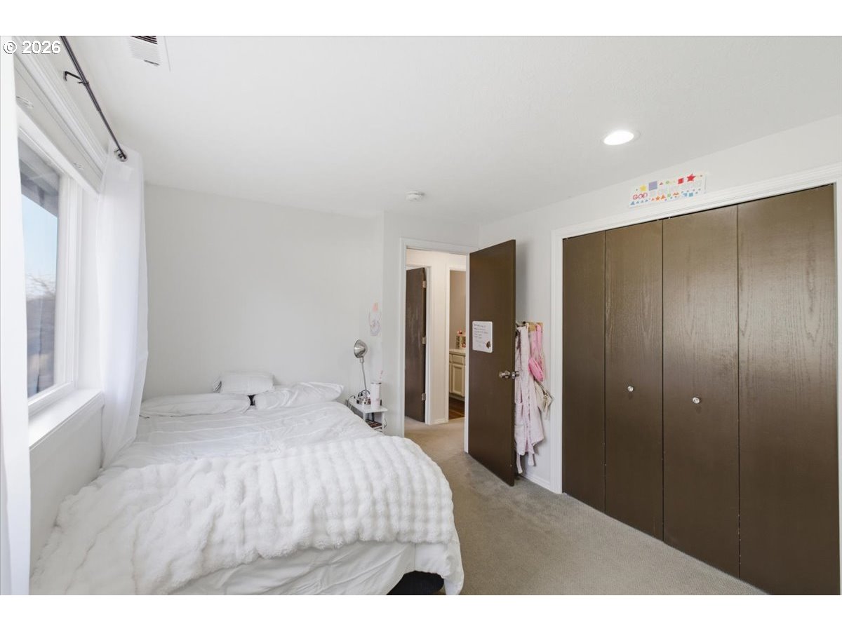 229 Hazelbrook Drive North Keizer, OR 97303 - Photo 38 of 48 a bedroom with a bed and a window