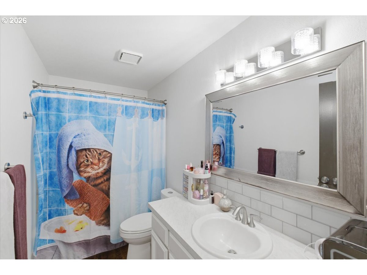 229 Hazelbrook Drive North Keizer, OR 97303 - Photo 40 of 48 a bathroom with a sink and mirror with toilet
