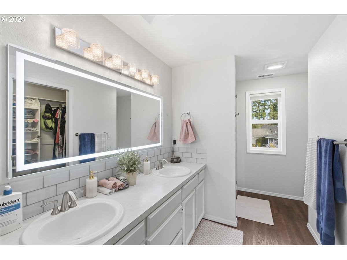 229 Hazelbrook Drive North Keizer, OR 97303 - Photo 41 of 48 a bathroom with a sink and a mirror