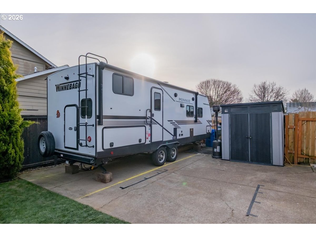 229 Hazelbrook Drive North Keizer, OR 97303 - Photo 48 of 48 a view of a house with a backyard and deck