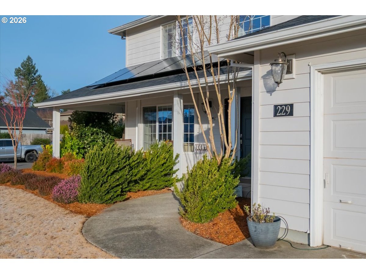 229 Hazelbrook Drive North Keizer, OR 97303 - Photo 5 of 48 a view of a house with a potted plant
