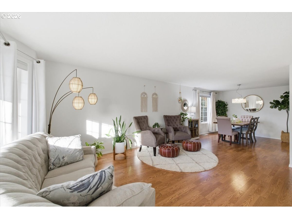 229 Hazelbrook Drive North Keizer, OR 97303 - Photo 7 of 48 a living room with furniture and wooden floor