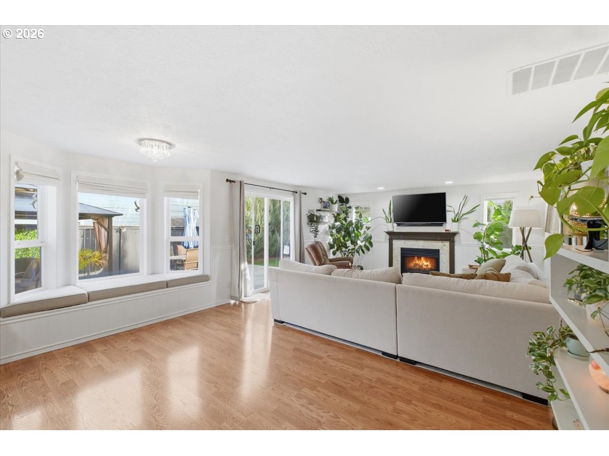 229 Hazelbrook Drive North Keizer, OR 97303 - Photo 10 of 48 a living room with furniture and a flat screen tv