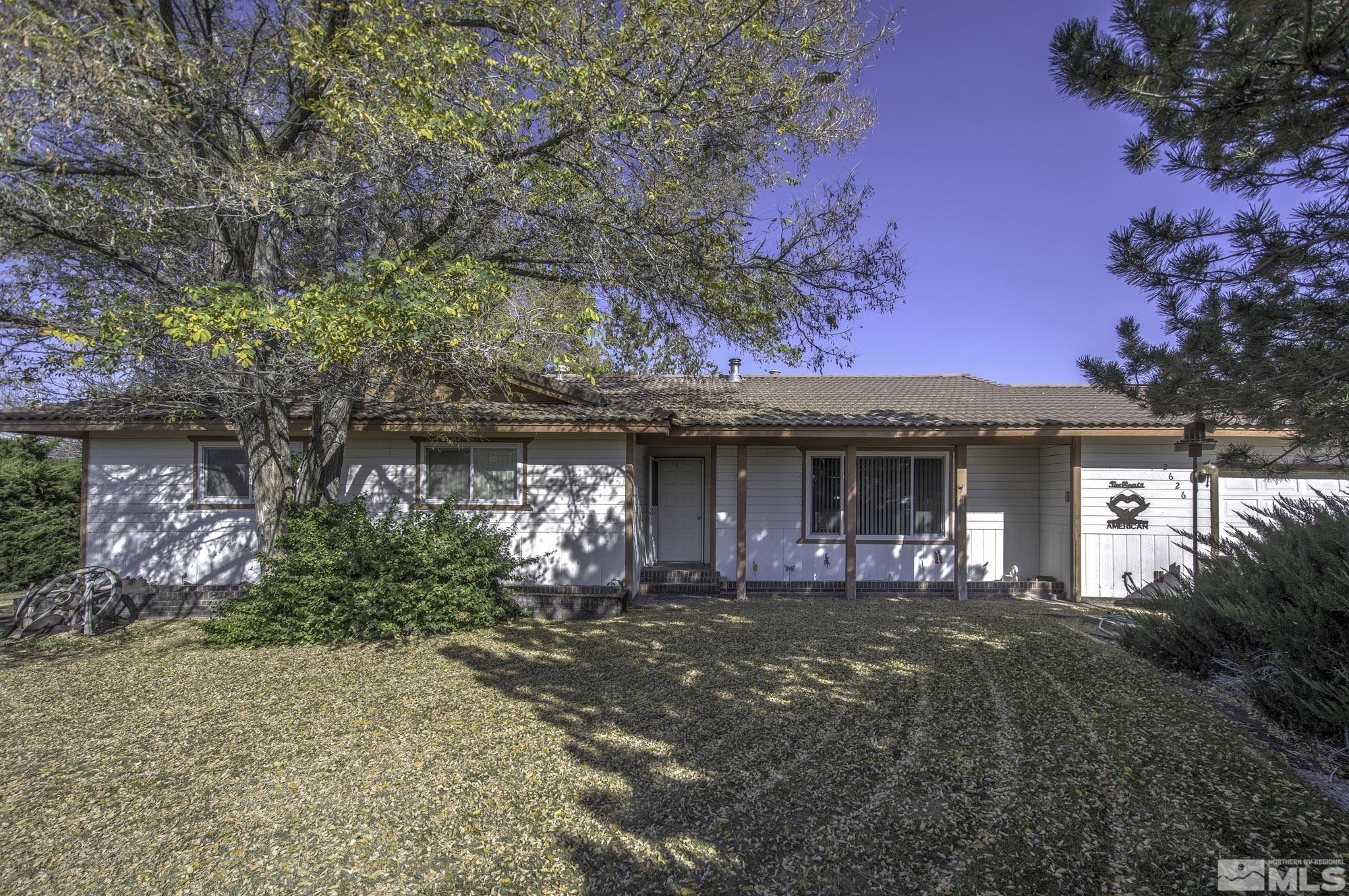 2626 Rice Road Fallon, NV 89406 - Photo 1 of 39 a front view of a house with yard