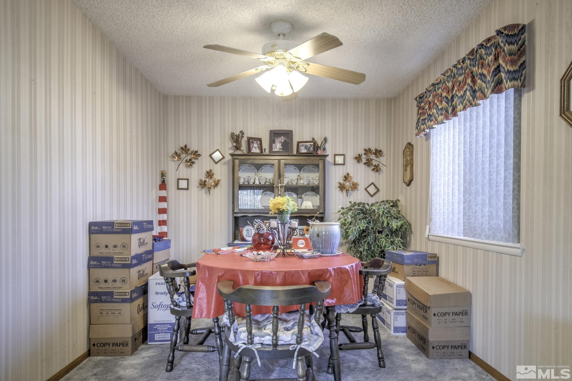 2626 Rice Road Fallon, NV 89406 - Photo 13 of 39 a dining room with furniture and window