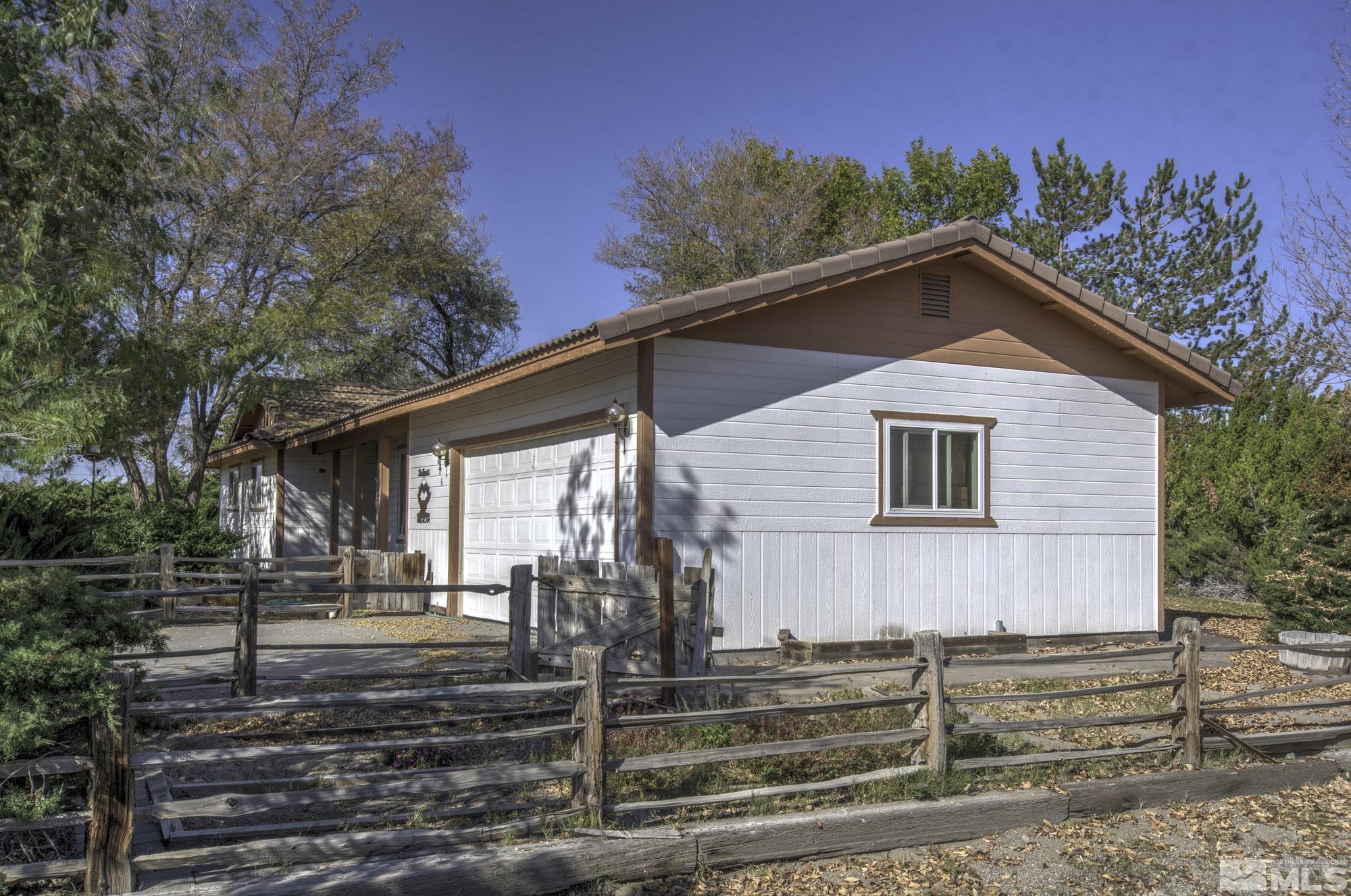 2626 Rice Road Fallon, NV 89406 - Photo 5 of 39 a front view of a house with a yard