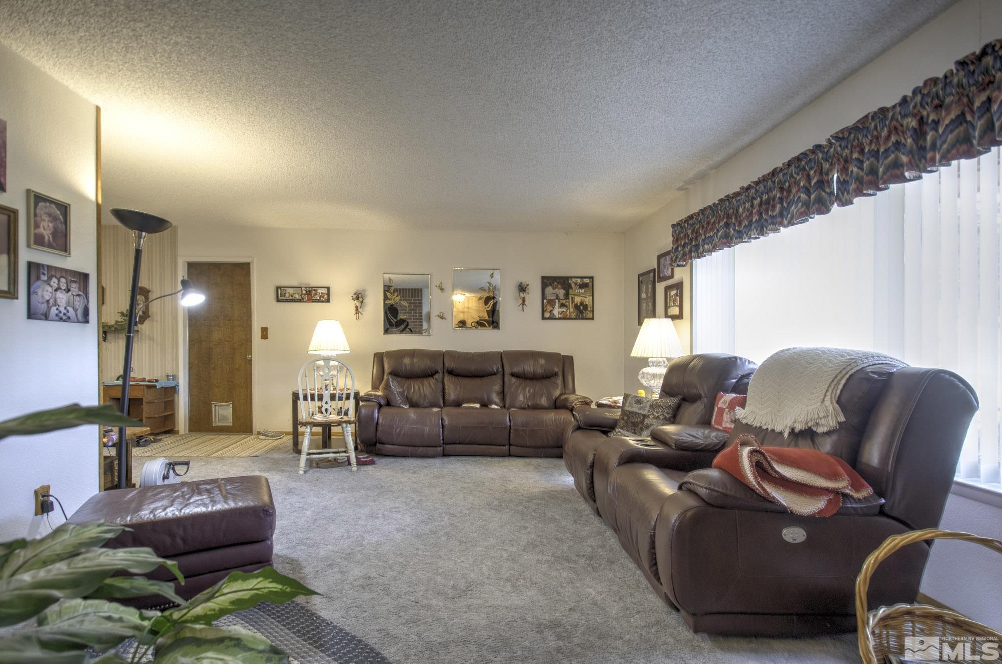 2626 Rice Road Fallon, NV 89406 - Photo 10 of 39 a living room with furniture and a couch