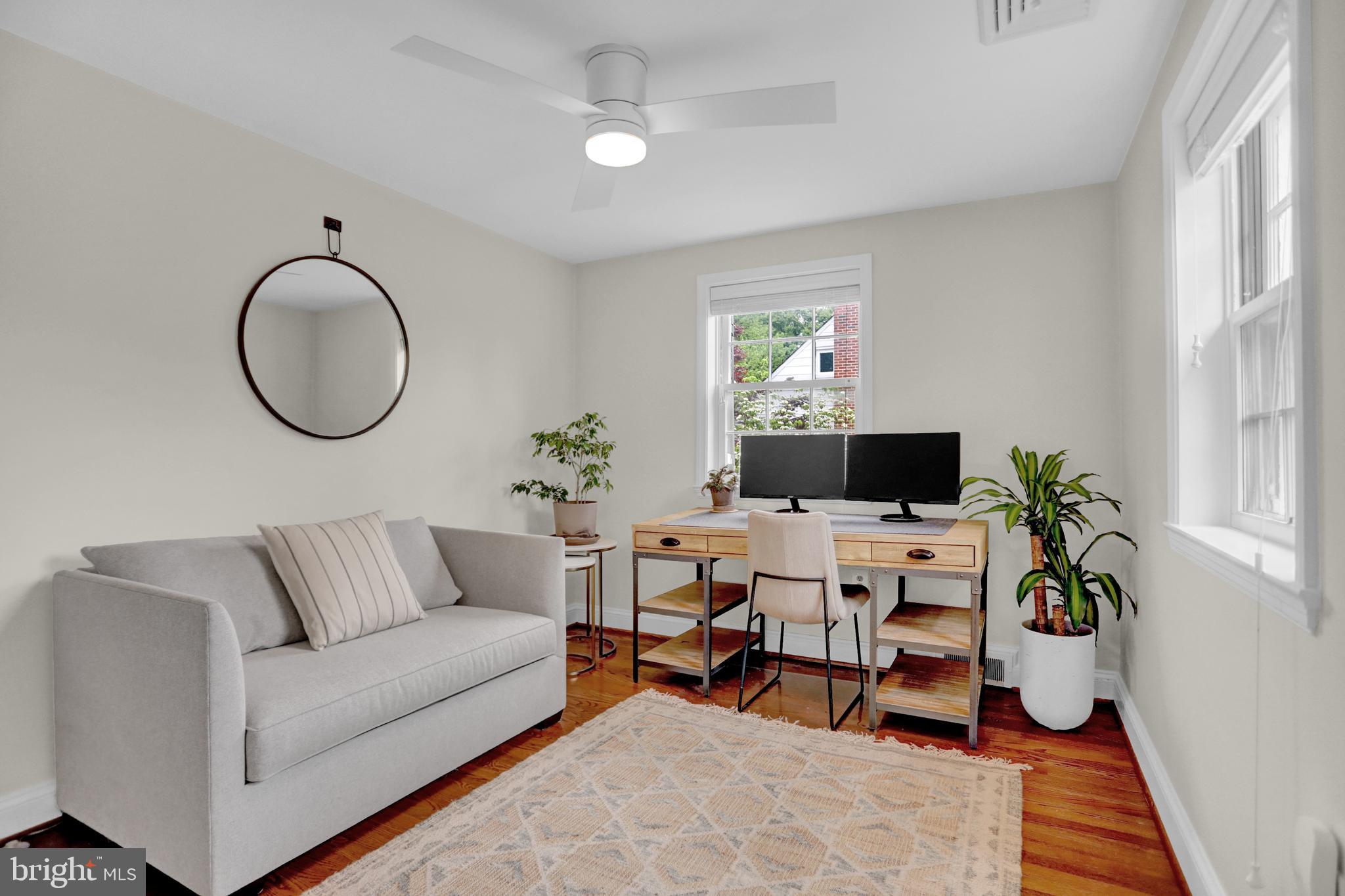 121 Croydon Road Baltimore, MD 21212 - Photo 34 of 57 a living room with furniture and a flat screen tv