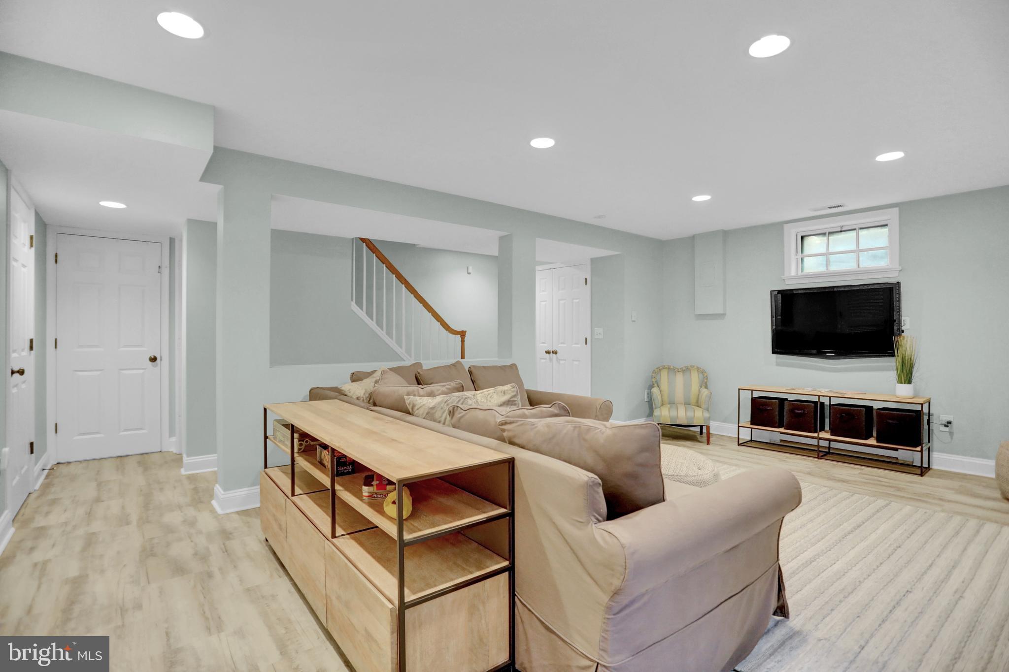 121 Croydon Road Baltimore, MD 21212 - Photo 36 of 57 a living room with furniture and a flat screen tv