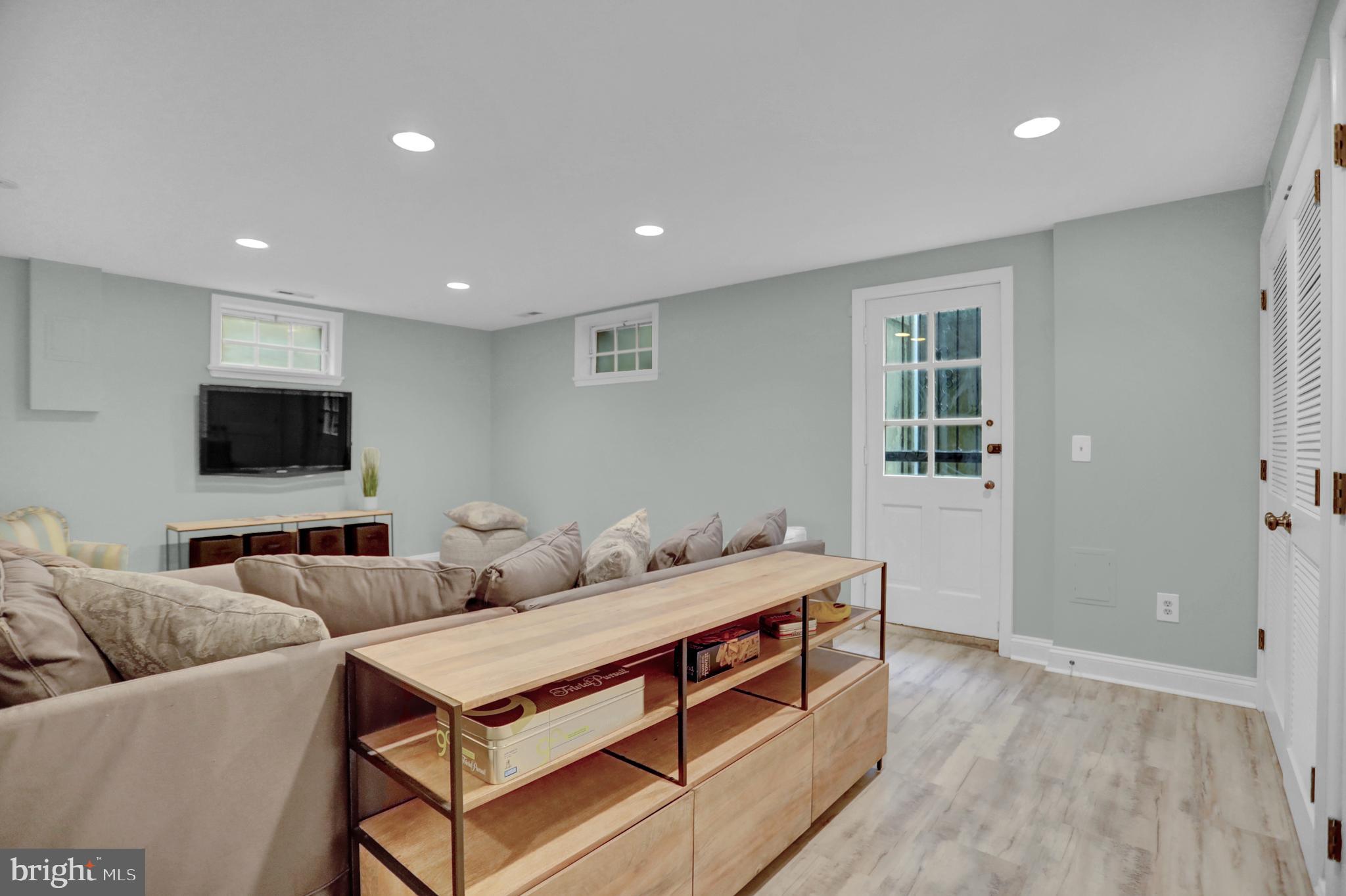 121 Croydon Road Baltimore, MD 21212 - Photo 37 of 57 a living room with furniture and a flat screen tv