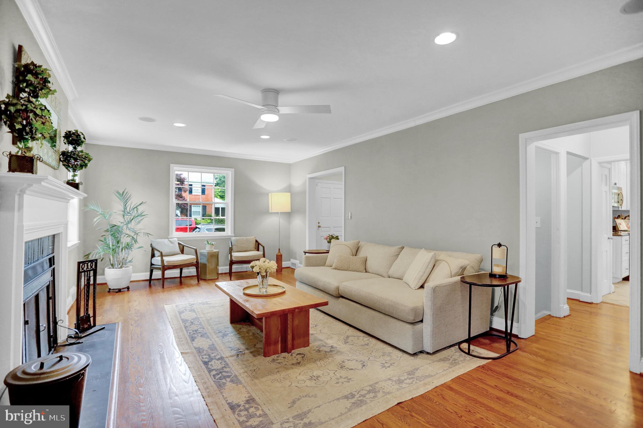 121 Croydon Road Baltimore, MD 21212 - Photo 5 of 57 a living room with furniture or couch and a fireplace