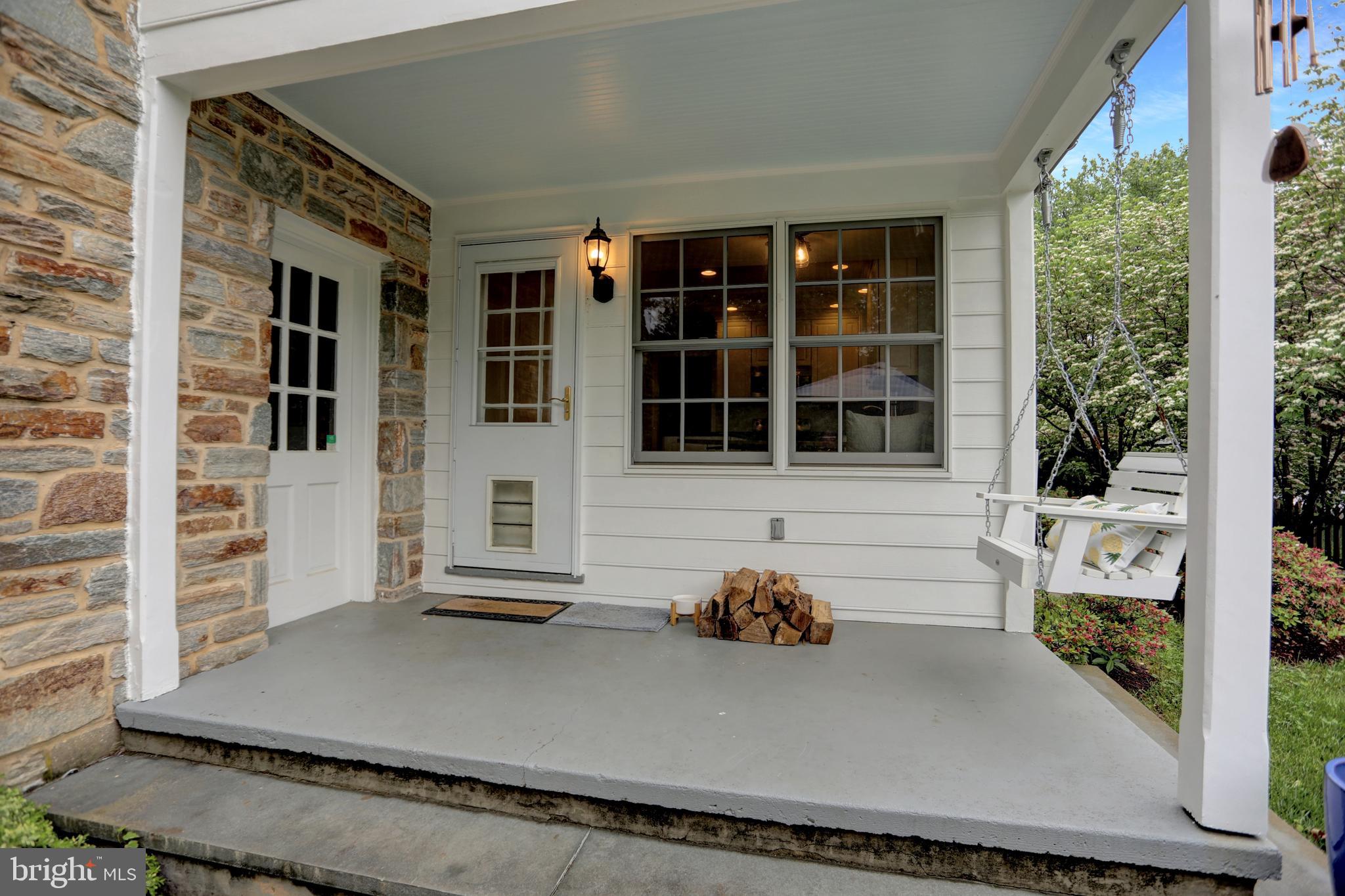121 Croydon Road Baltimore, MD 21212 - Photo 55 of 57 Enjoy summer reading on the porch swing!