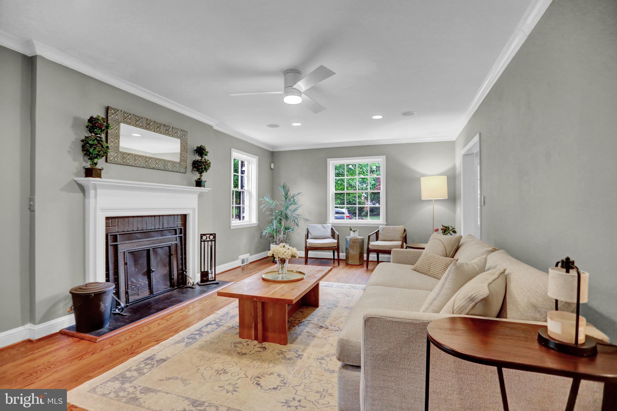 121 Croydon Road Baltimore, MD 21212 - Photo 6 of 57 a living room with furniture fireplace and window