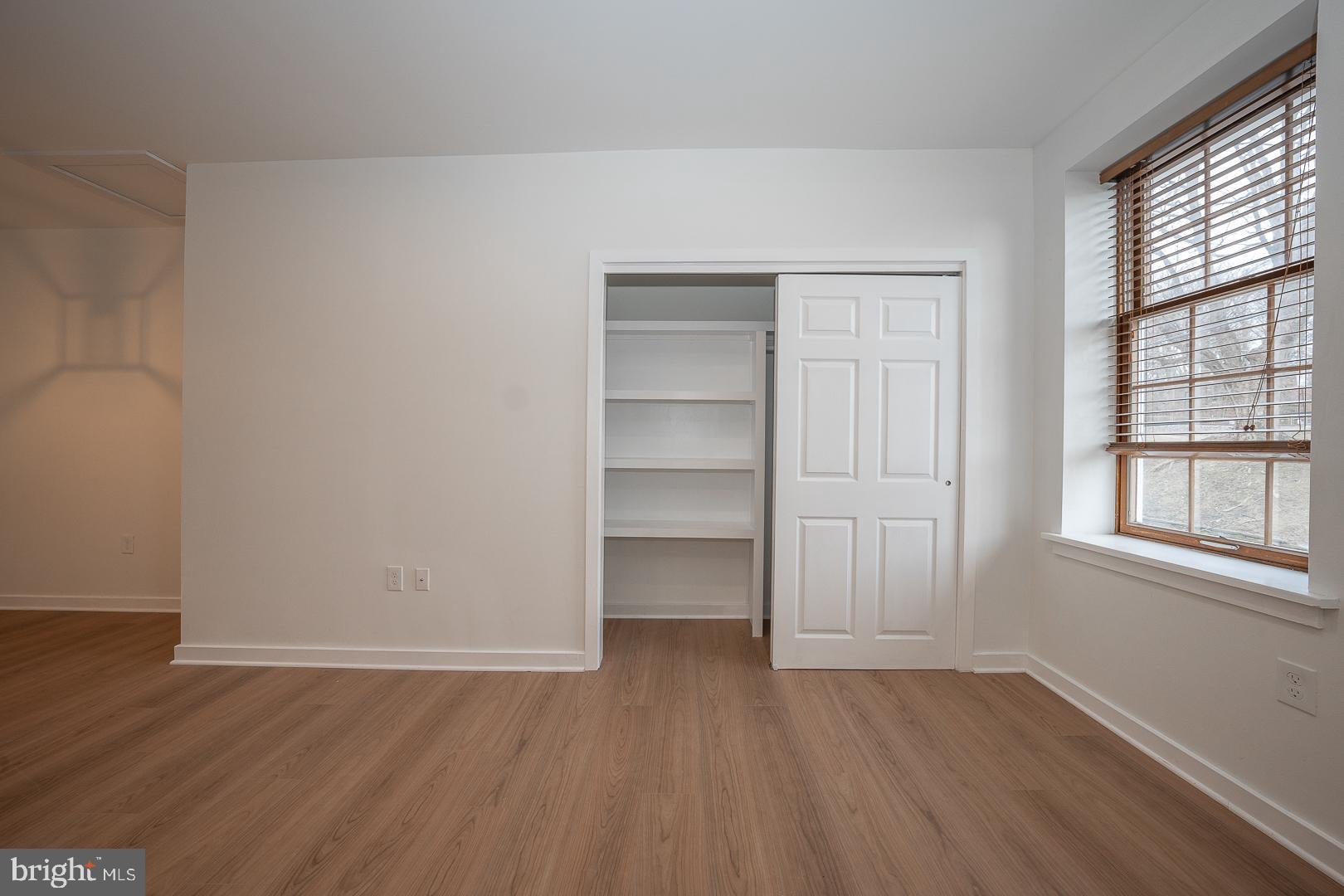 42 North Waterloo Road, Unit 38 Devon, PA 19333 - Photo 13 of 31 Built-ins in LR closet