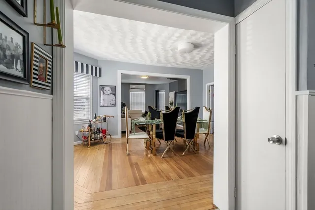 a view of a living room and dining room