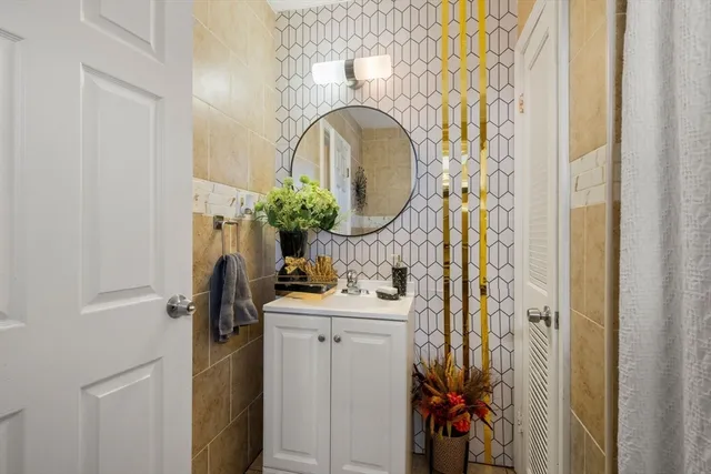 a bathroom with a sink and a mirror