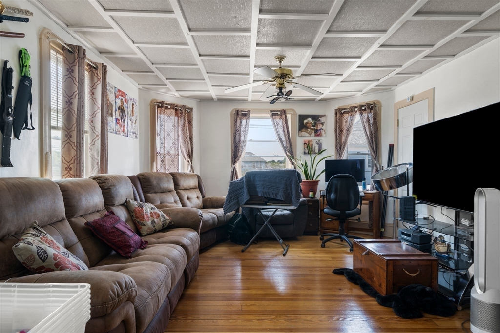 248-250 Jefferson Street Fall River, MA 02721 - Photo 24 of 37 a living room with furniture and a flat screen tv