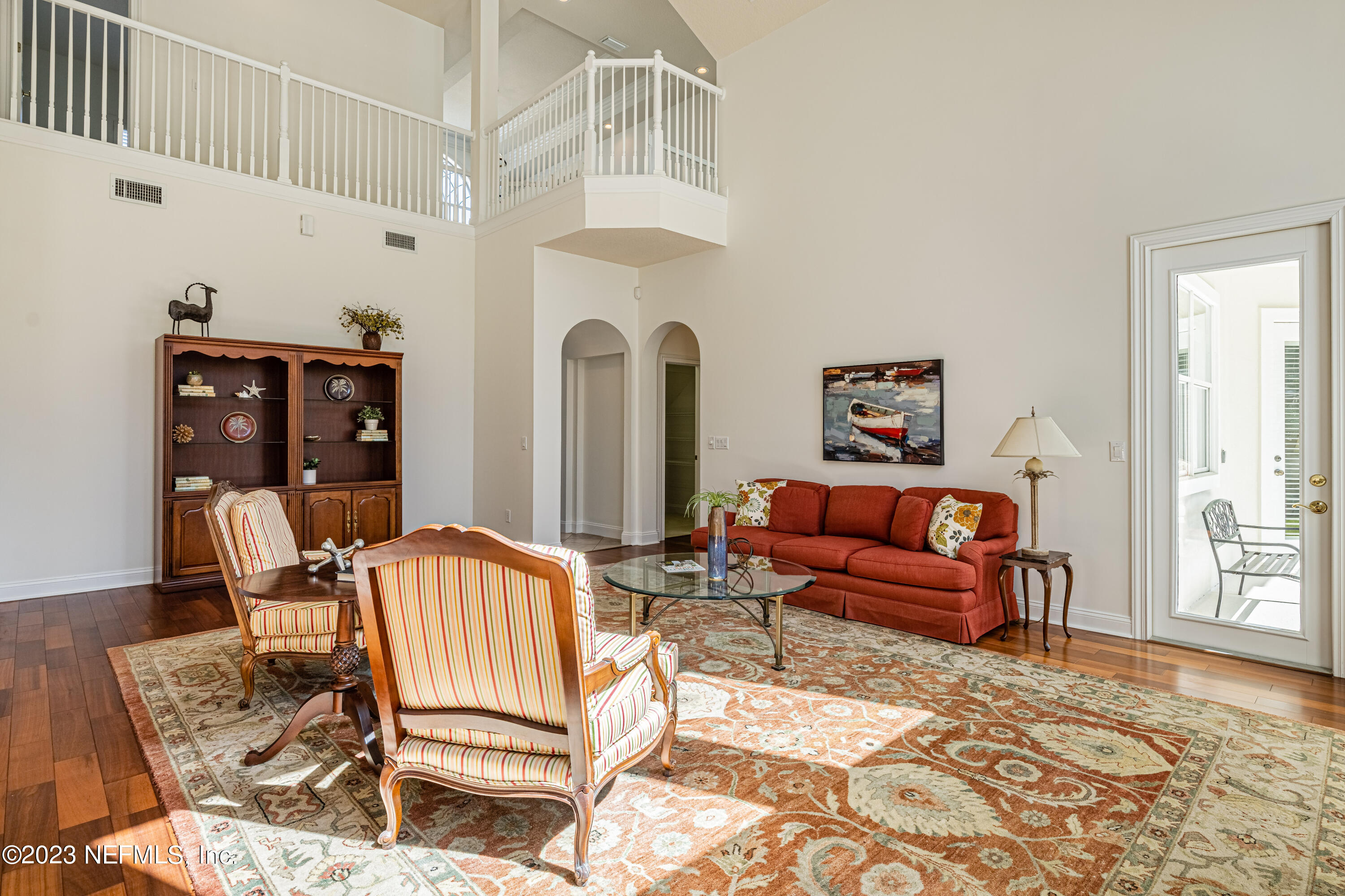 513 Fresh Pond Road Ponte Vedra Beach, FL 32082 - Photo 16 of 58 a living room with furniture and wooden floor