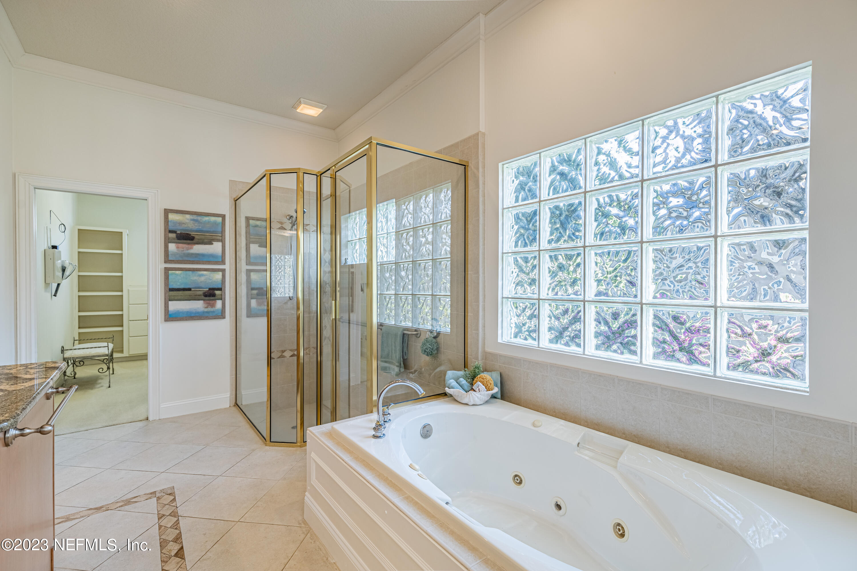 513 Fresh Pond Road Ponte Vedra Beach, FL 32082 - Photo 19 of 58 a bathroom with a bathtub and a shower
