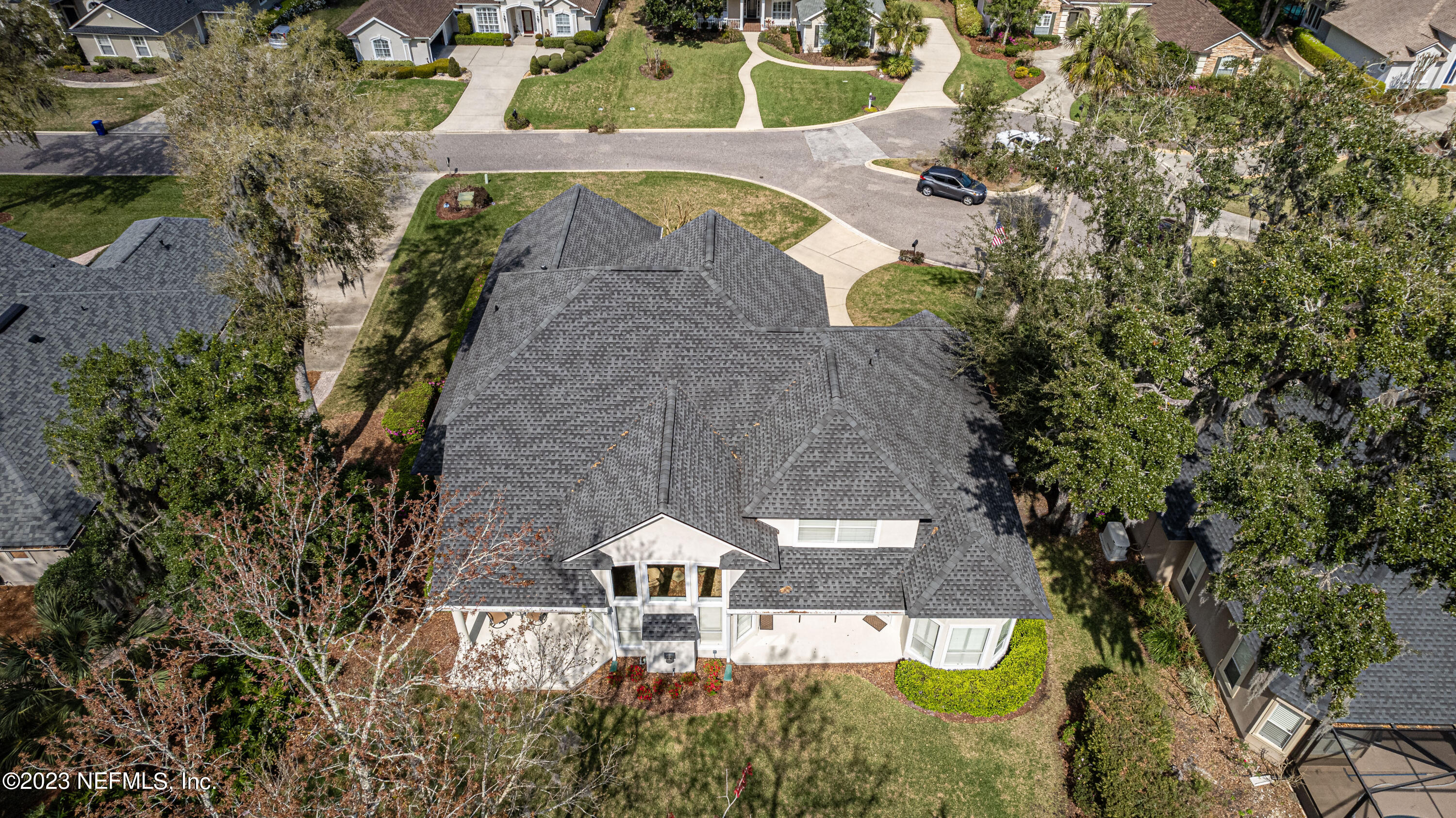 513 Fresh Pond Road Ponte Vedra Beach, FL 32082 - Photo 23 of 58 an aerial view of a house with a yard