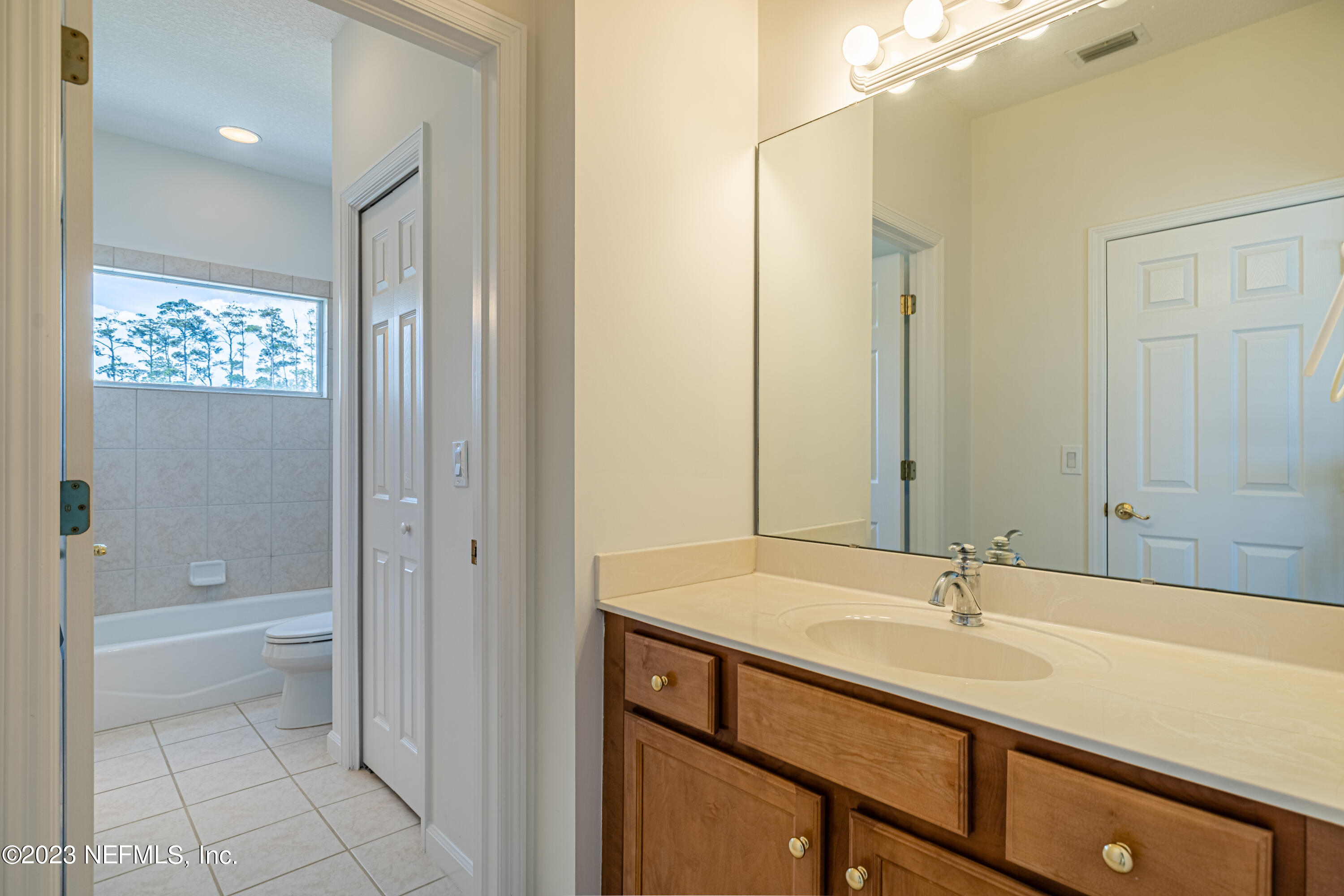513 Fresh Pond Road Ponte Vedra Beach, FL 32082 - Photo 31 of 58 a bathroom with a sink a toilet and shower