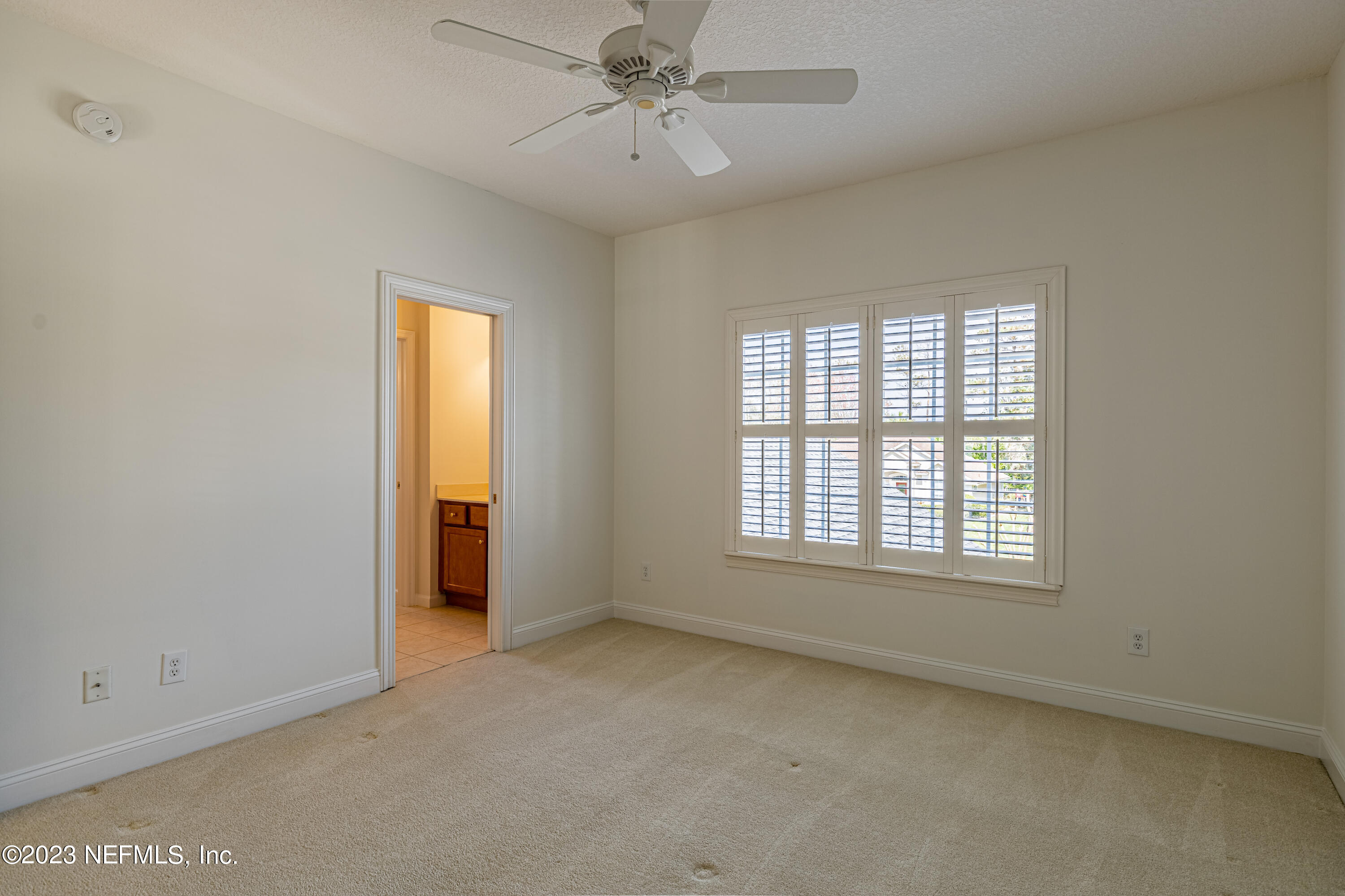 513 Fresh Pond Road Ponte Vedra Beach, FL 32082 - Photo 37 of 58 a view of an empty room with a window