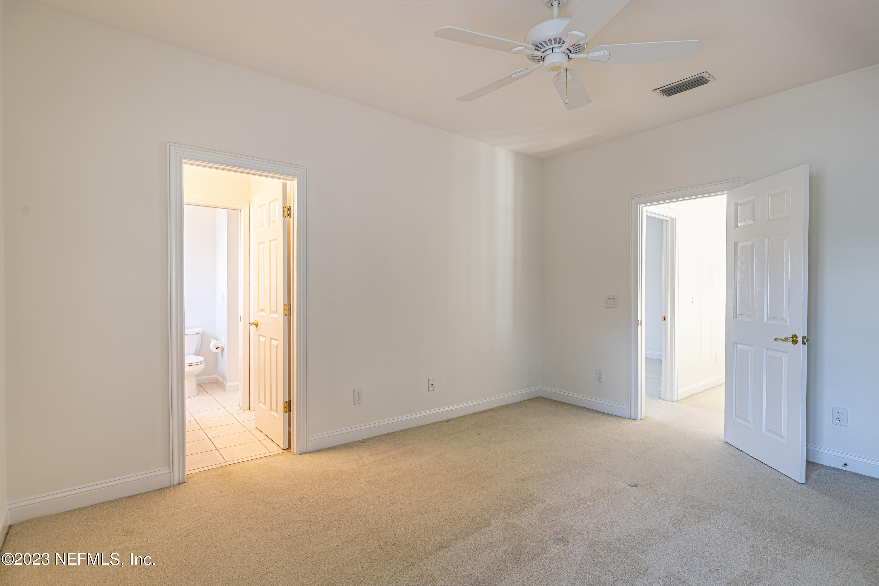 513 Fresh Pond Road Ponte Vedra Beach, FL 32082 - Photo 38 of 58 an empty room with a ceiling fan and a window