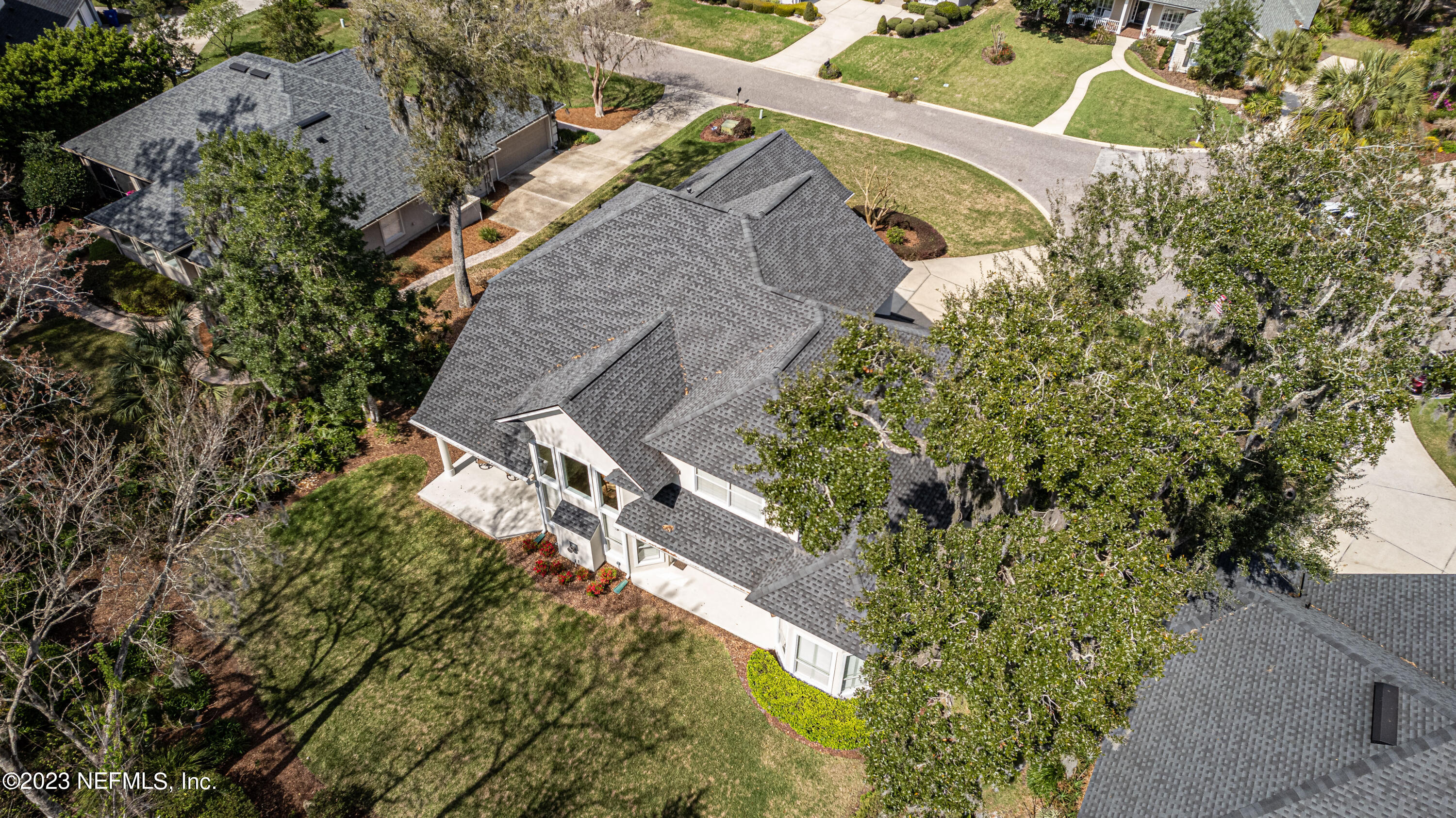 513 Fresh Pond Road Ponte Vedra Beach, FL 32082 - Photo 41 of 58 an aerial view of a house with a yard and trees