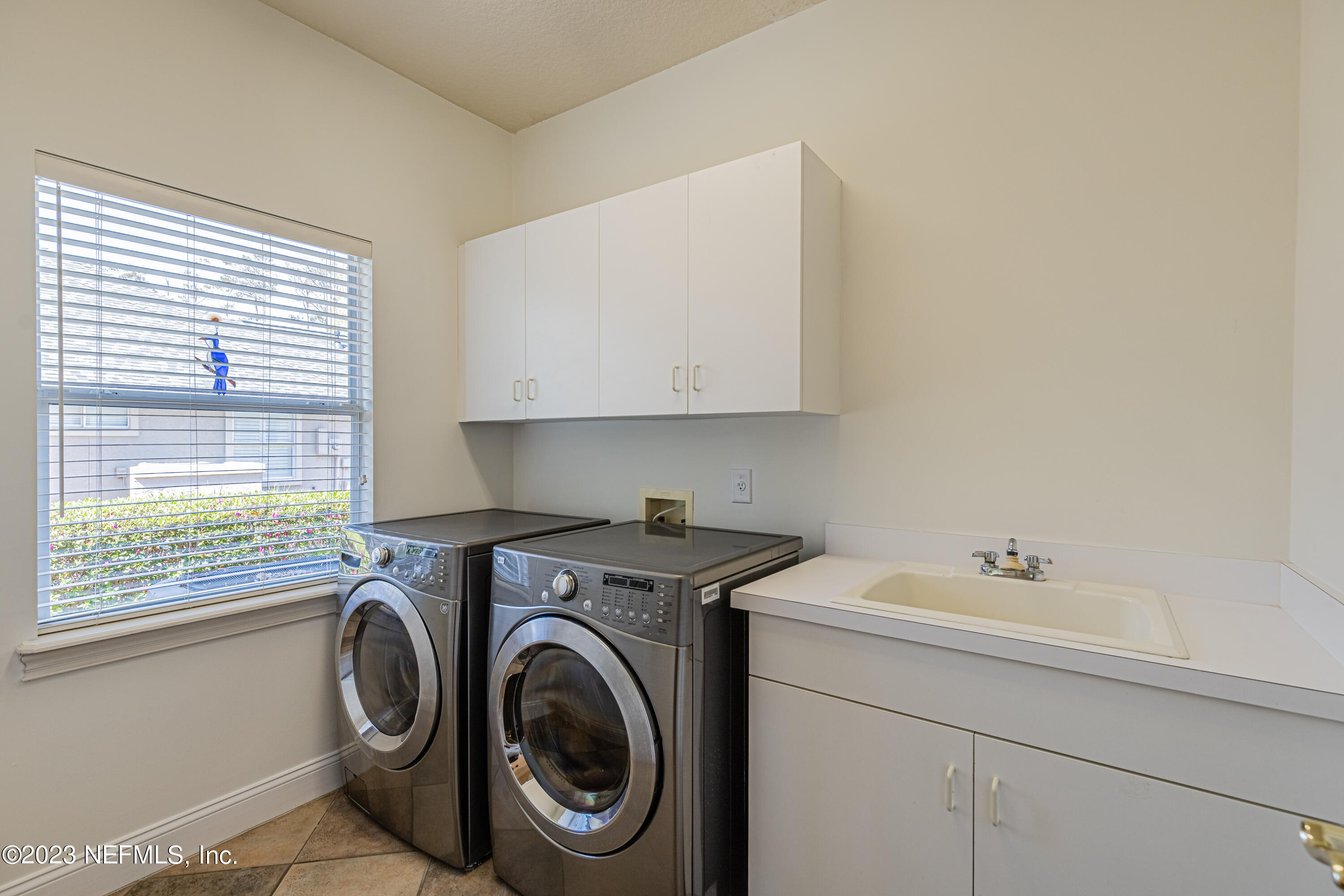 513 Fresh Pond Road Ponte Vedra Beach, FL 32082 - Photo 51 of 58 a utility room with sink dryer and washer