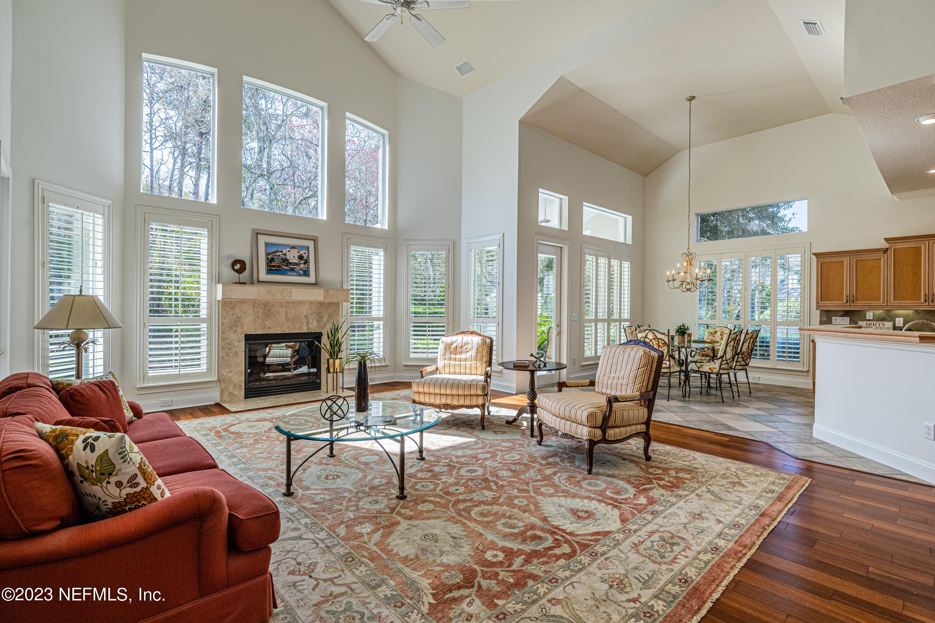 513 Fresh Pond Road Ponte Vedra Beach, FL 32082 - Photo 52 of 58 a living room with furniture fireplace and a table