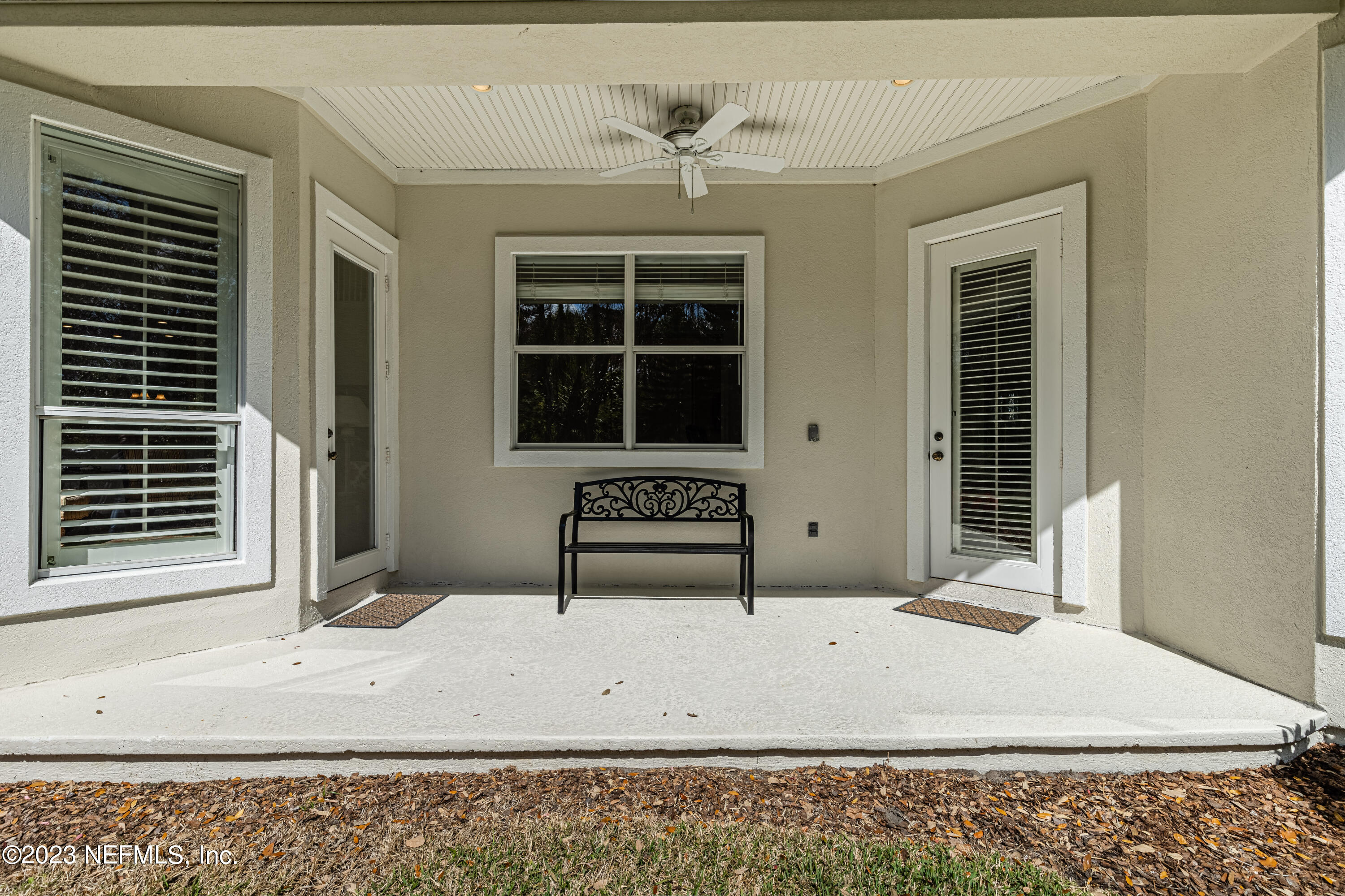 513 Fresh Pond Road Ponte Vedra Beach, FL 32082 - Photo 55 of 58 a white and yellow sitting area in front of a house