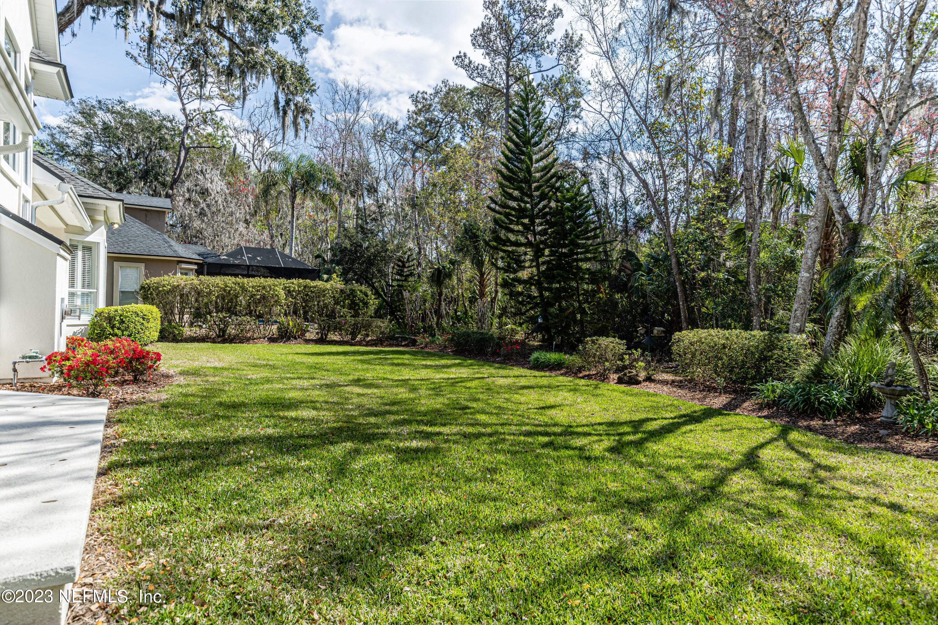 513 Fresh Pond Road Ponte Vedra Beach, FL 32082 - Photo 56 of 58 a view of a house with a yard