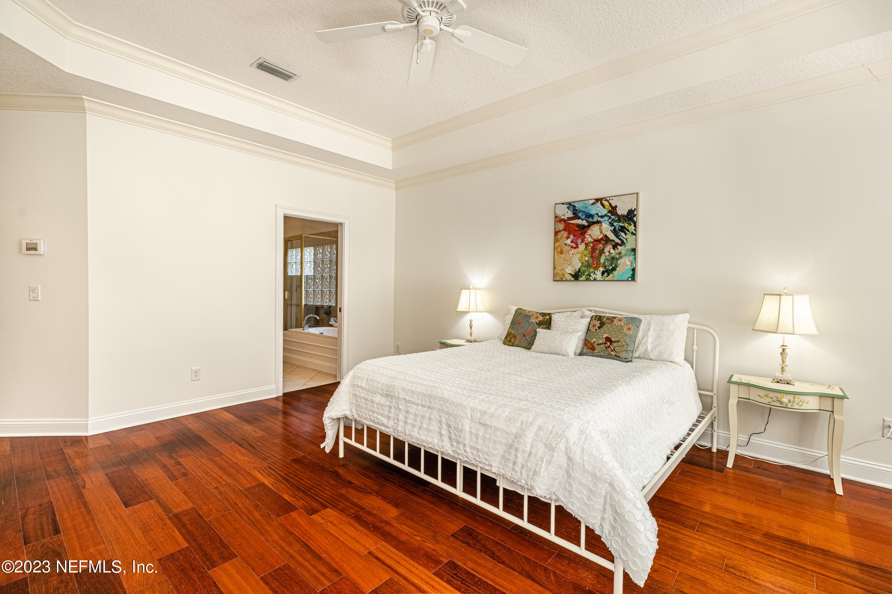 513 Fresh Pond Road Ponte Vedra Beach, FL 32082 - Photo 7 of 58 a bedroom with a bed and a table