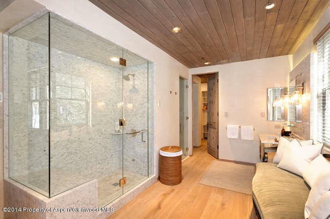 1240 Riverside Drive Aspen, CO 81611 - Photo 13 of 17 a bathroom with a double vanity sink toilet and shower