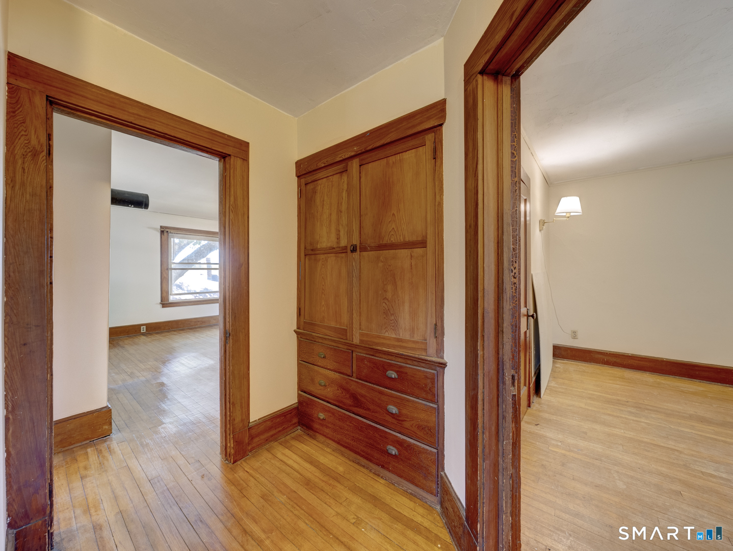 81 Chestnut Street Windham, CT 06226 - Photo 29 of 40 Hallway on second floor with built in