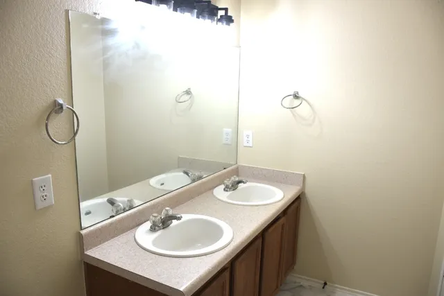 a bathroom with a toilet and a bathtub