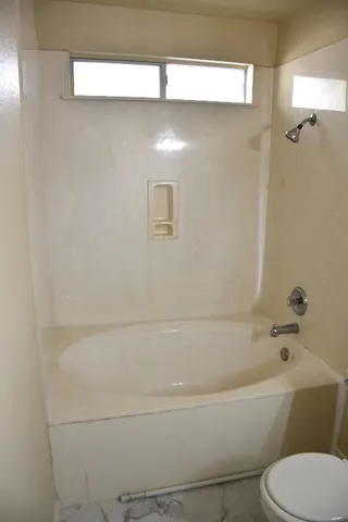 a view of outdoor space with wooden fence