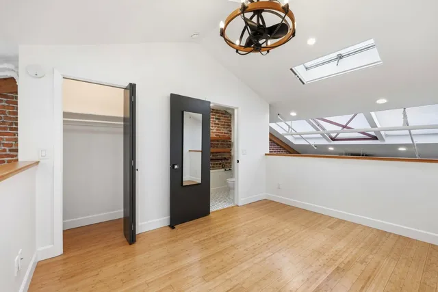 a view of street along with parked cars