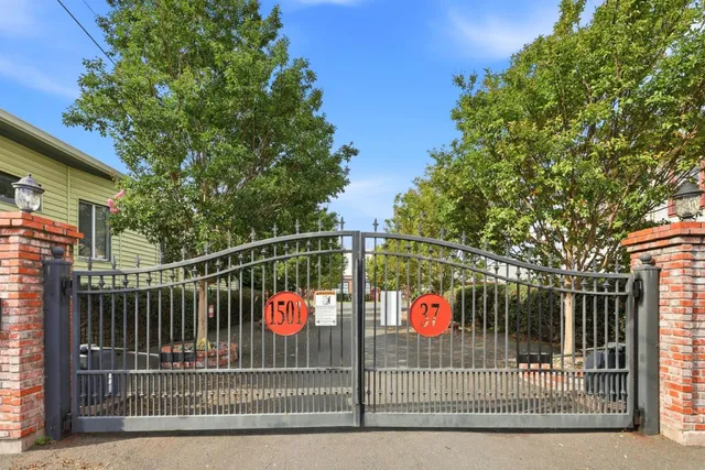 a view of a car park in front of house